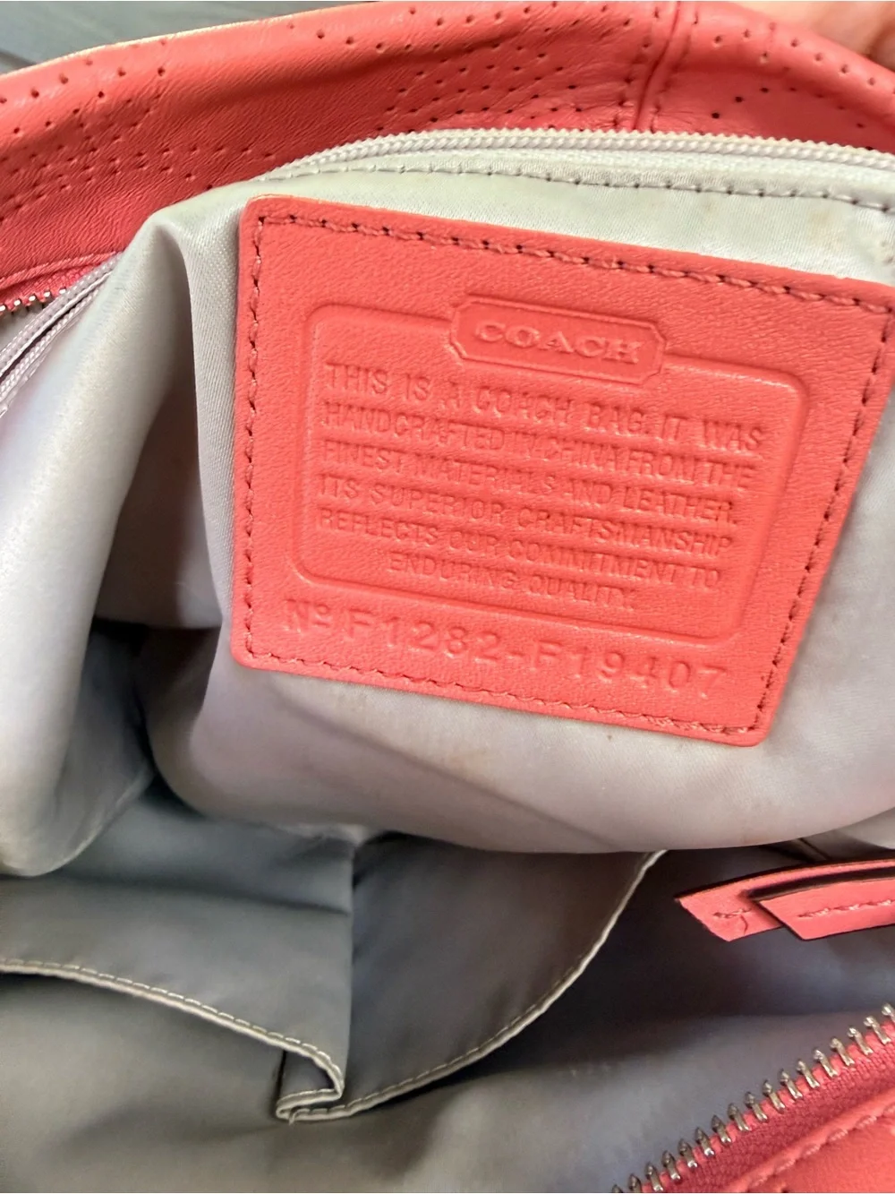 Coral Perforated Leather Shoulder Bag
